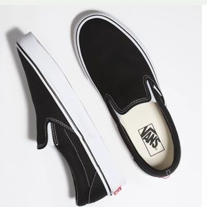 Black/White slip on vans size 7 worn couple times only